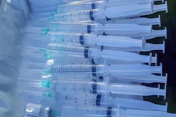 Syringes and doses of medicines.concept of professional medical care