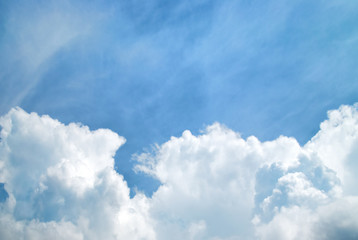 Naklejka na ściany i meble White clouds on blue sky as nature background