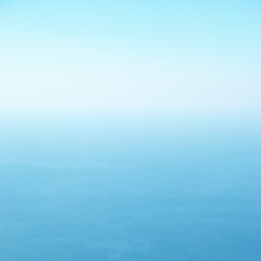 Fototapeta na wymiar Calm blue sea and clear sky as nature background