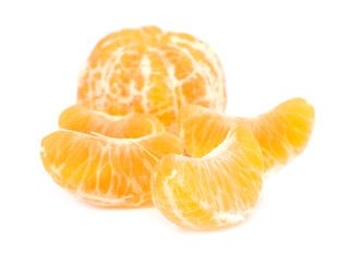 Orange peeled mandarin and slices without skin isolated on white background