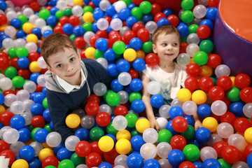Fototapeta na wymiar Children in ball pool