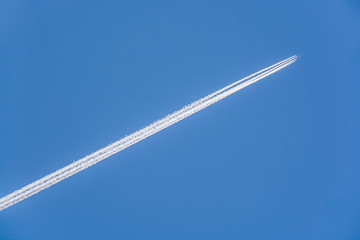 Large passenger plane against the blue sky