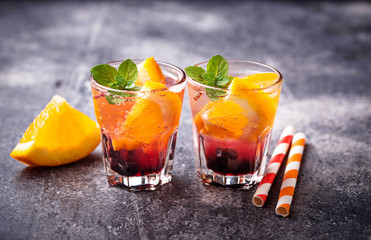 Summer  drink with orange and berries