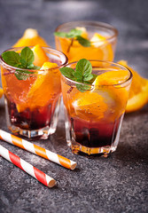 Summer  drink with orange and berries
