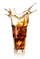 glass of cola with big splash isolated on white background