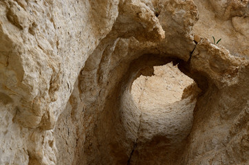 Hole in the rock of Nahal Darga canyon ,Judean desert, Israel, famous natural landmark