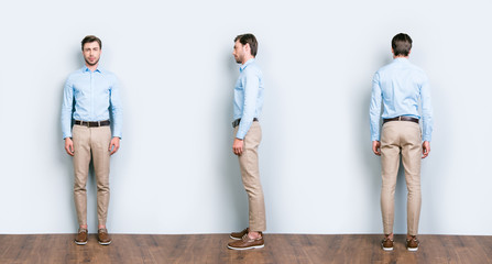 Collage of three full length portrait from all side of perfect, cool, attractive man in blue shirt, pants standing near grey wall on wooden floor