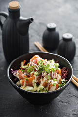 Poke bowl with salmon and vegetables