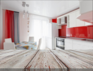 Wooden desk on kitchen background
