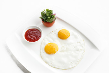 Sunny side up eggs served in the restoraunt for breakfast