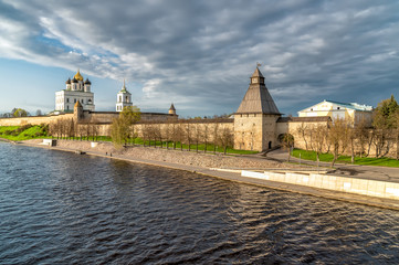 Fototapeta na wymiar View of the Pskov Krom or Kremlin from the Velikaya River at sunset, Russia