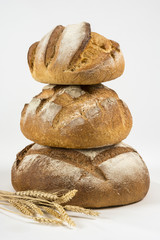 Balanced pile of artisan rustic bread