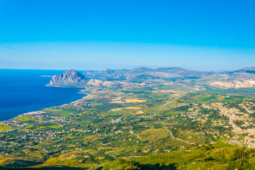 Aerial view of sicilian coast dominated by monte cofano, Italy