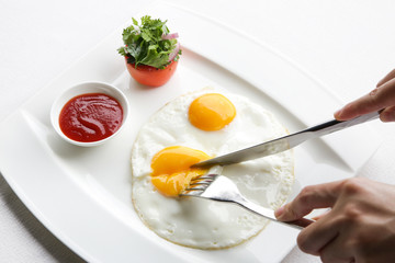 Sunny side up eggs served in the restoraunt for breakfast