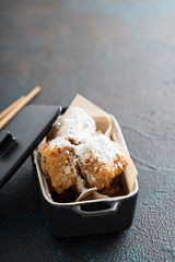 Asian style fried donuts with powdered sugar