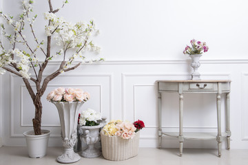 Elegant interior decoration with flowers on  white wedding background