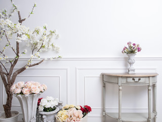 Elegant interior decoration with flowers on  white wedding background