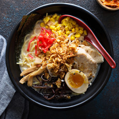Spicy ramen bowl with noodles and chicken