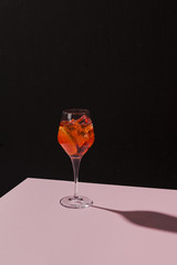 Spritz veneziano, IBA cocktail in a calix on a table, pop graphic style