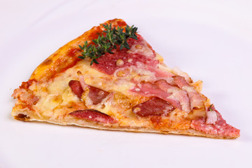 Pizza with ham and sausages