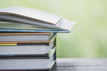 Books stack on the wooden chair for business, education back to school concept.