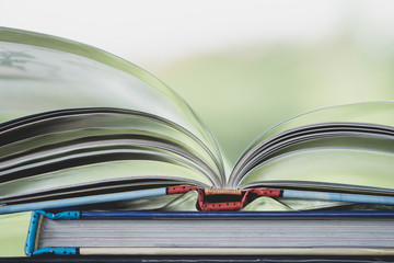 Books stack on the wooden chair for business, education back to school concept.