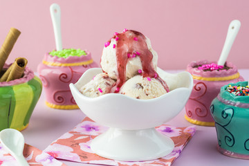 Ice cream and topping for ice cream.