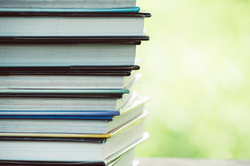 Books stack on the wooden chair for business, education back to school concept.