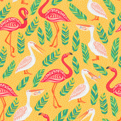Pink flamingos, pelicans, tropical leaves on yellow background. 