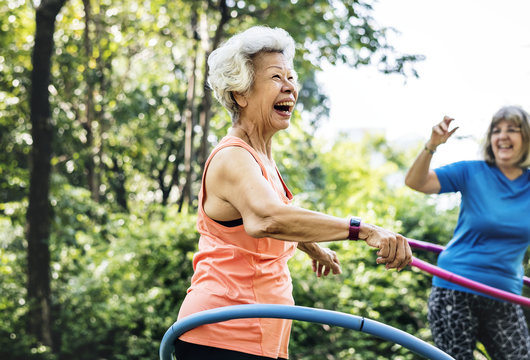 Senior Woman Exercising With A Hula Hoop