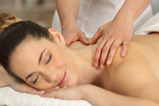 Therapist having a massage to a patient