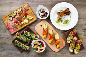 Buffet of Mediterranean snacks flat lay on table. Assorted gourmet food, chef's meals, luxury restaurant menu, appetizers variety