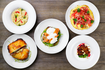 Breakfast meals variety, restaurant menu photo, set of delicious nourishing morning diet meals, flat lay.