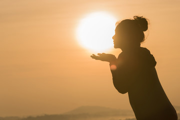 Fototapeta premium women Travel nature in the mountains,Woman watching the sunrise.