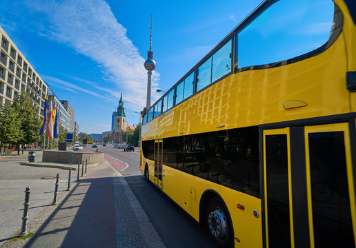 Berlin yellow tourist bus near Berliner Dom
