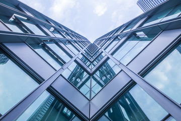 Obraz premium Bottom view of office building window close up