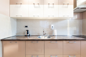 Kitchen in open plan hotel apartment interior