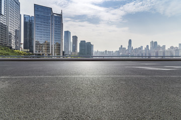 Panoramic skyline and buildings with empty road，chongqing city，china
