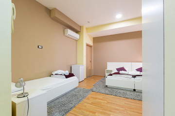 Interior of a modern luxury hotel bedroom