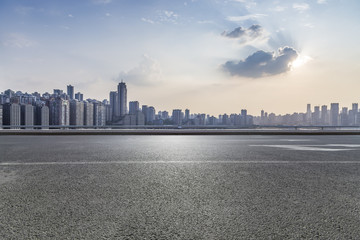 Panoramic skyline and buildings with empty road