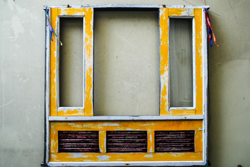 Vintage yellow window frame without glass