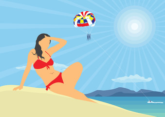 Girl in a swimsuit on the beach. Girl in a red swimsuit on the background of the sea landscape.