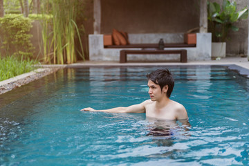 man playing in swimming pool