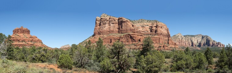 Fototapeta premium Panorama view of Bell Rock and Courthouse Butte from Red Rock Scenic Byway in Sedona, Arizona