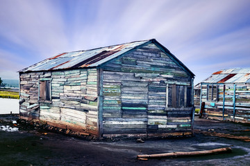Fototapeta na wymiar Wooden houses in the village of fishermen