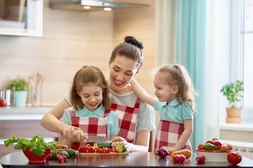 Happy family in the kitchen.