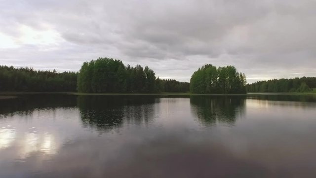 An aerial view over lake after the sunset 4k