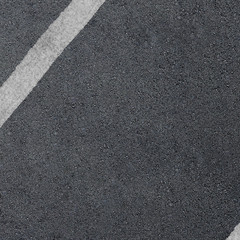 Fototapeta premium New asphalt texture with white dashed line