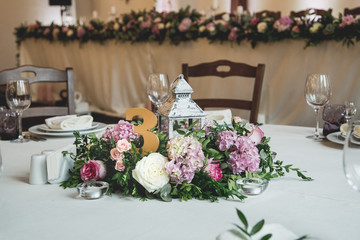 Luxury decorated dinner hall in white and brown tones
