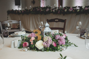 Luxury decorated dinner hall in white and brown tones